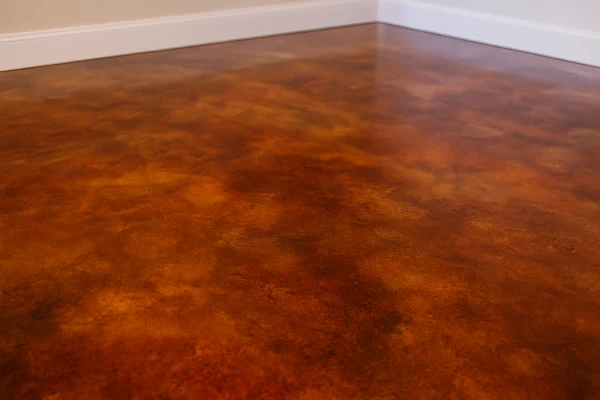 a red epoxy floor from Concrete Contractor Austin in Austin, TX - Concrete Cutting Services